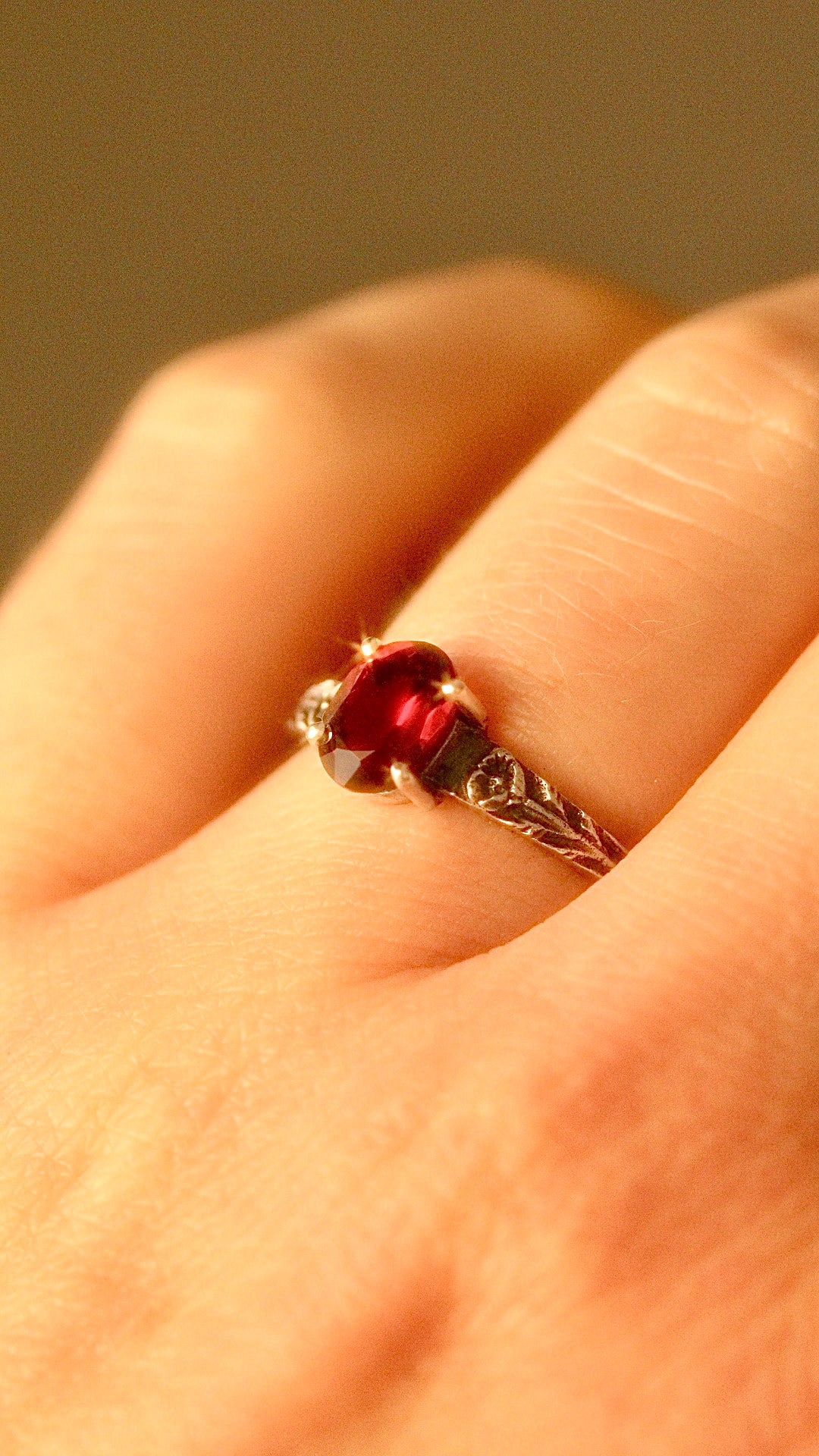 Silver poppy ring with prong set red garnet (preorder)
