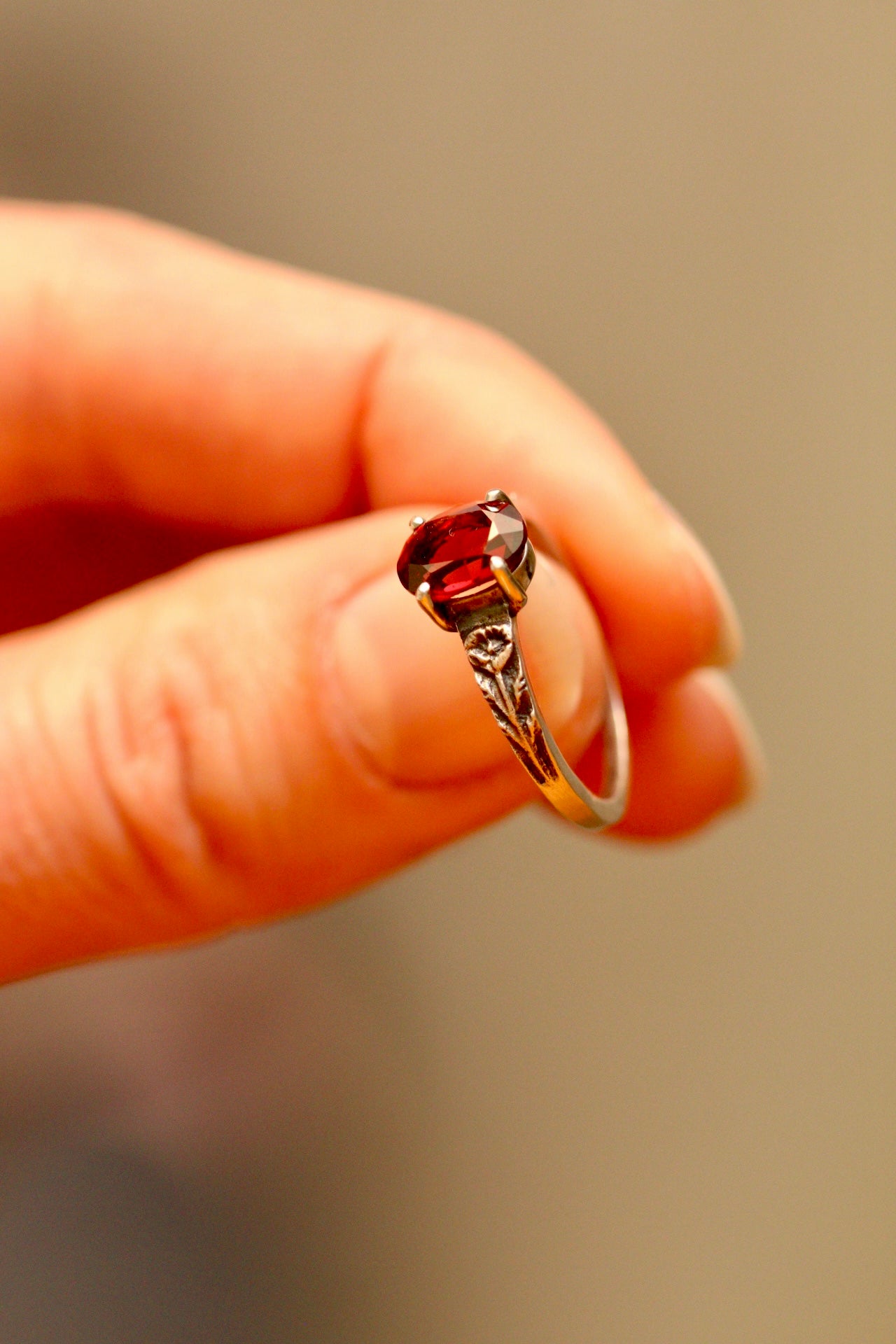 Silver poppy ring with prong set red garnet (preorder)