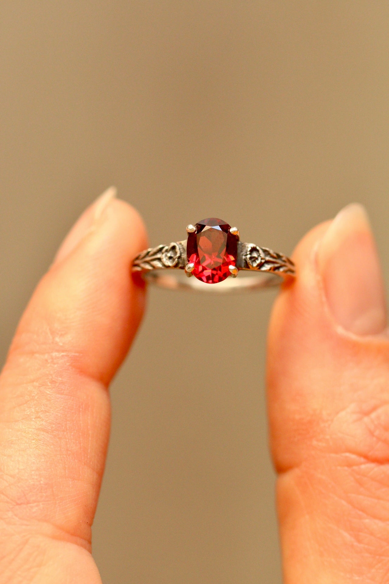 Silver poppy ring with prong set red garnet (preorder)
