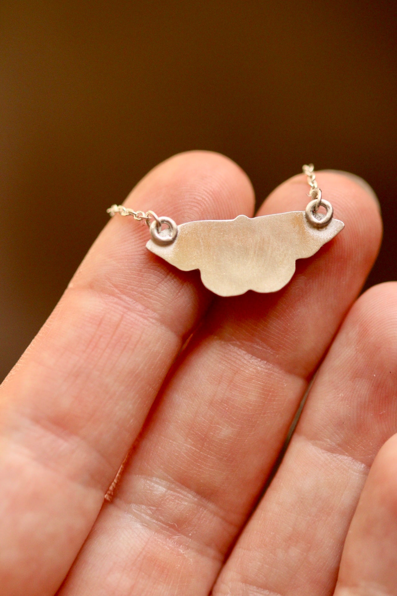 Pink silk moth pendant