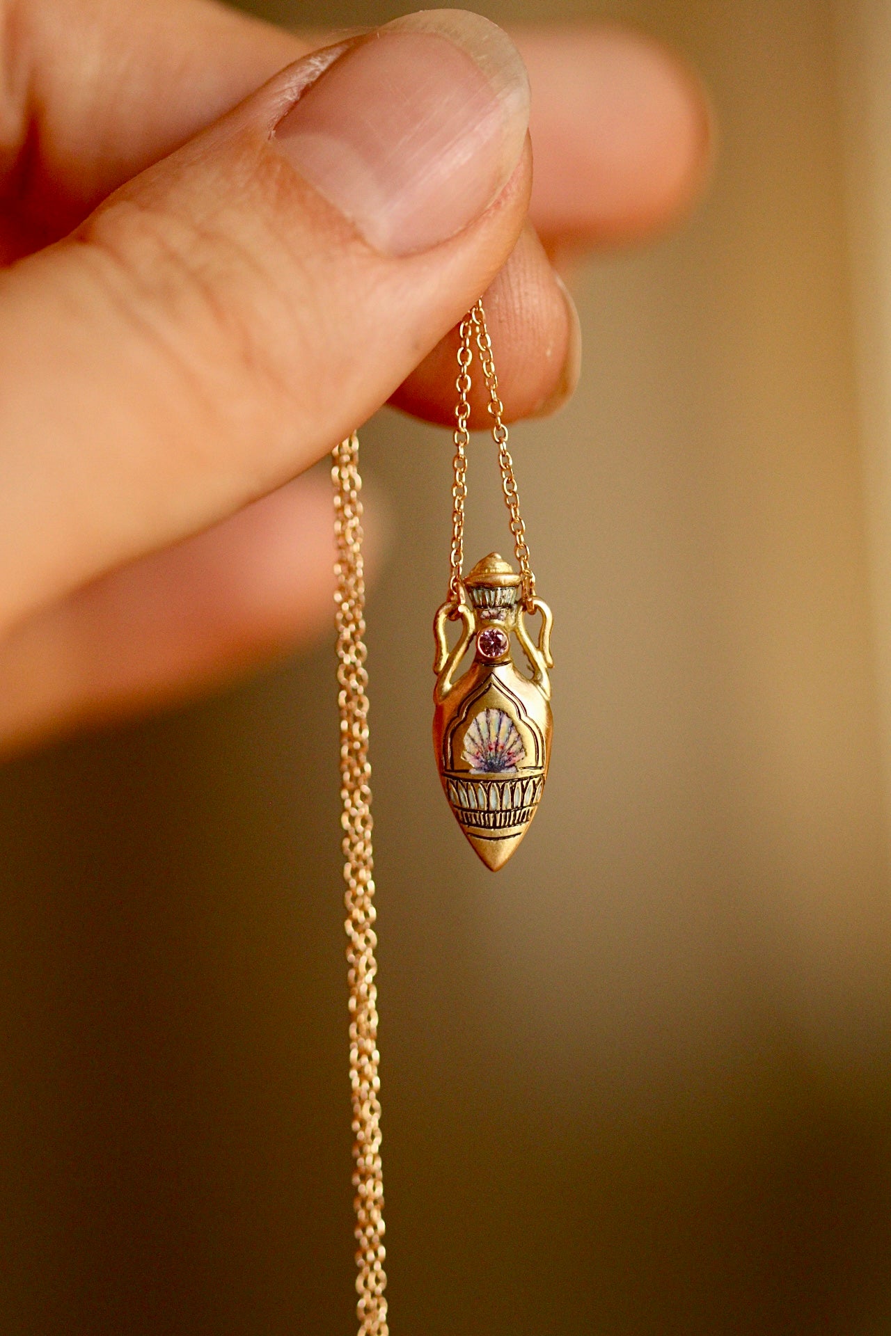 solid 14k gold amphora pendant with shell and sapphire