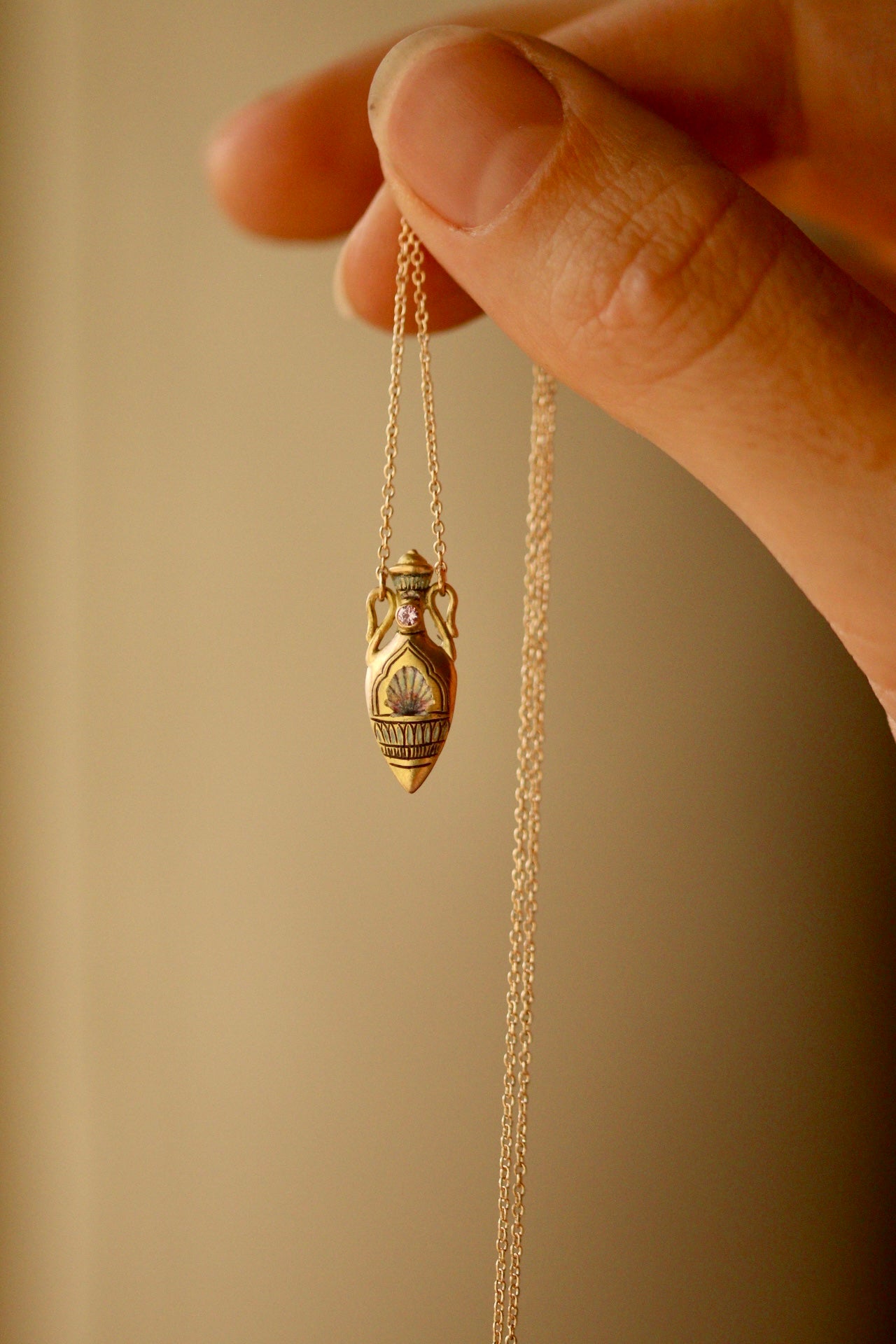 solid 14k gold amphora pendant with shell and sapphire
