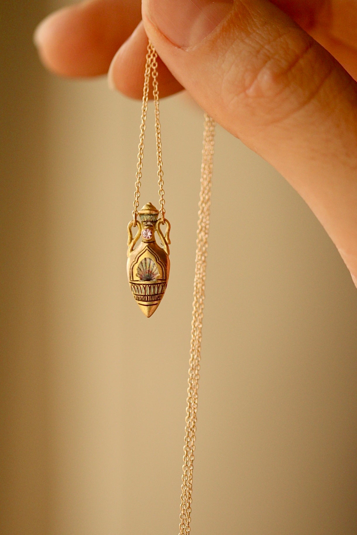 solid 14k gold amphora pendant with shell and sapphire