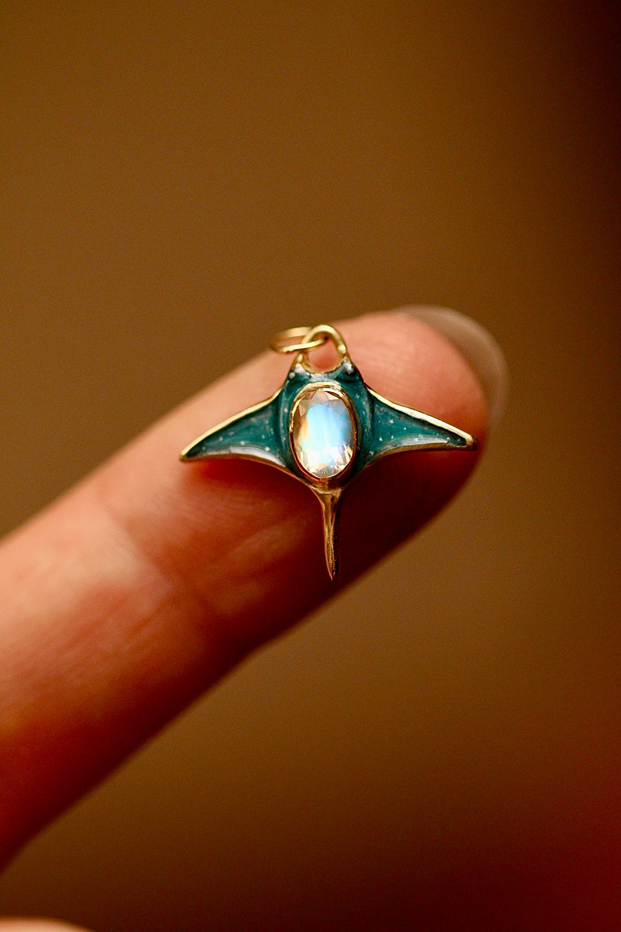 Solid 18k gold manta ray pendant with moonstone