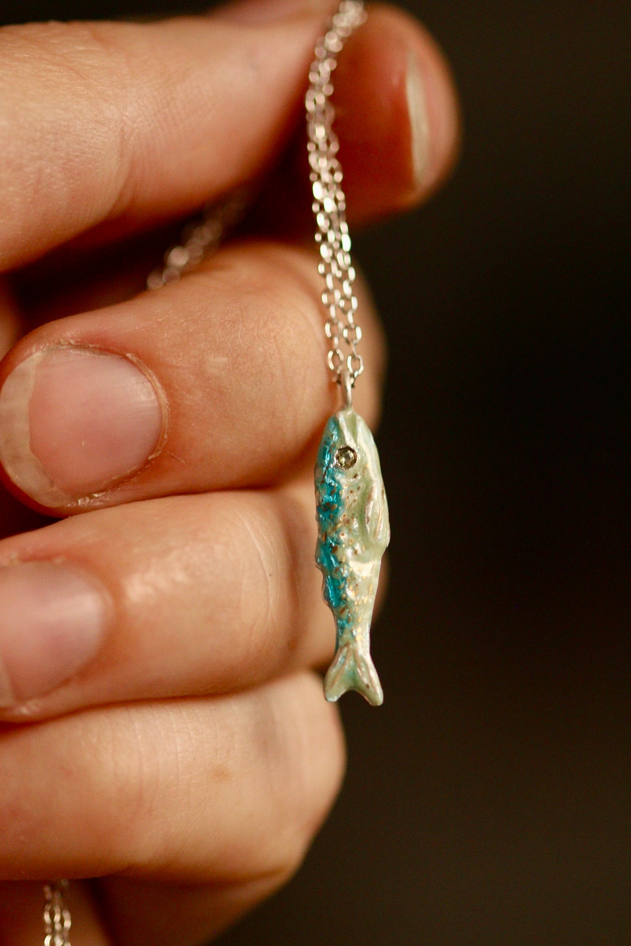 Enamel fish pendant with sapphire