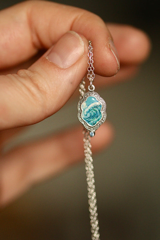 An awesome wave portal pendant