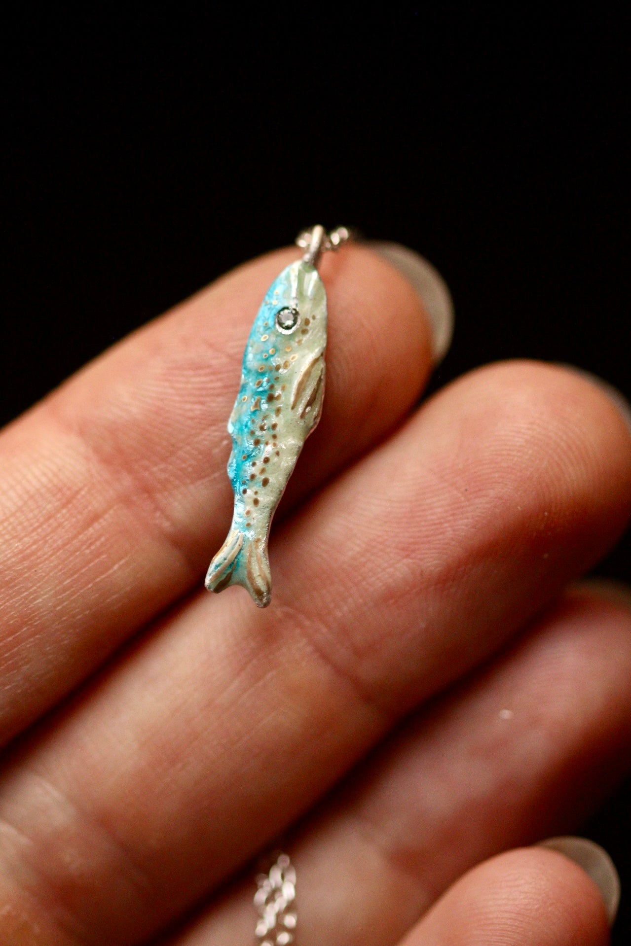Enamel fish pendant with sapphire