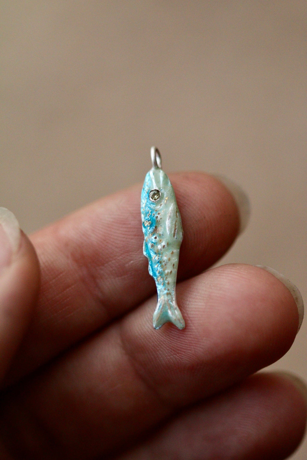 Enamel fish pendant with sapphire