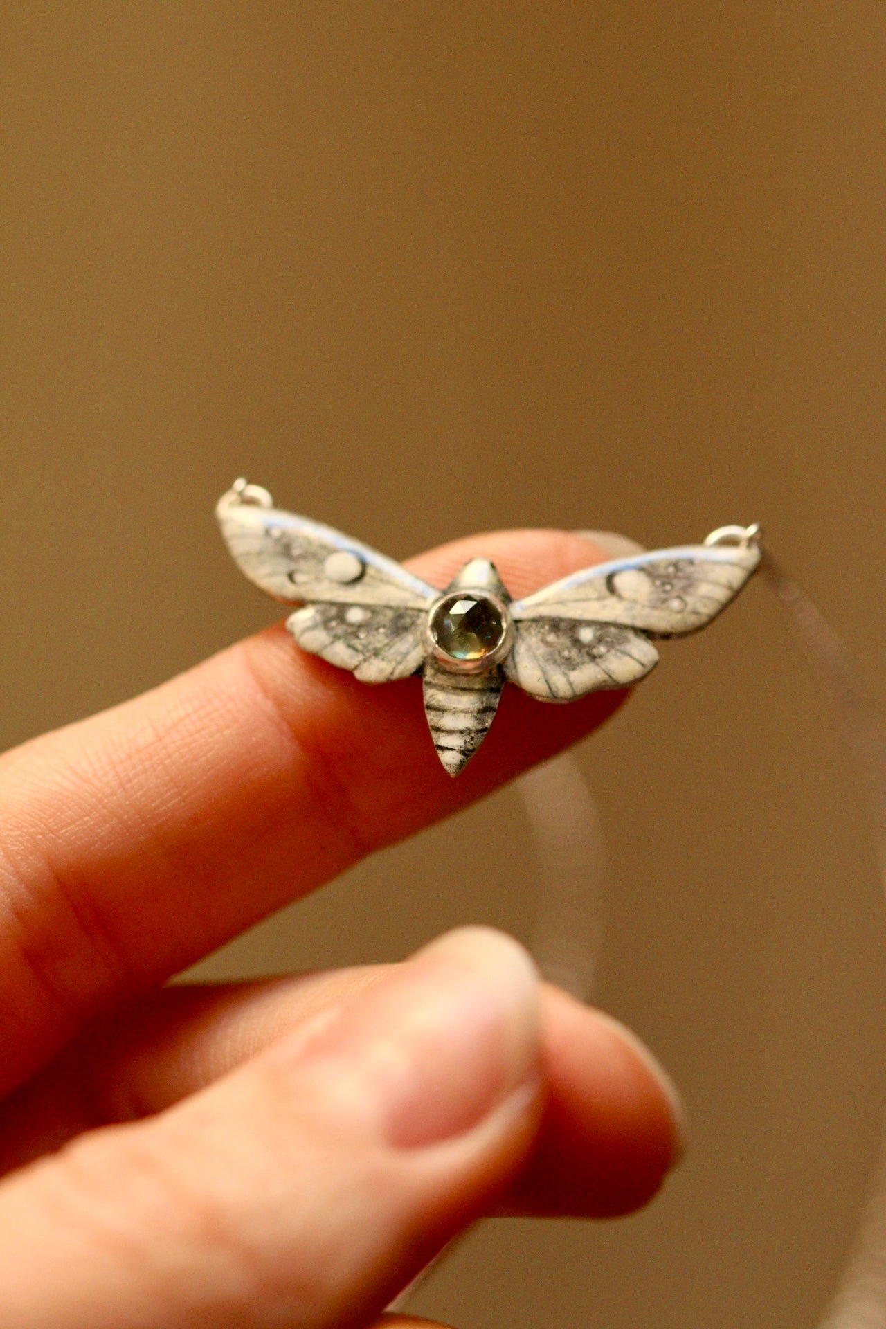 White moth pendant