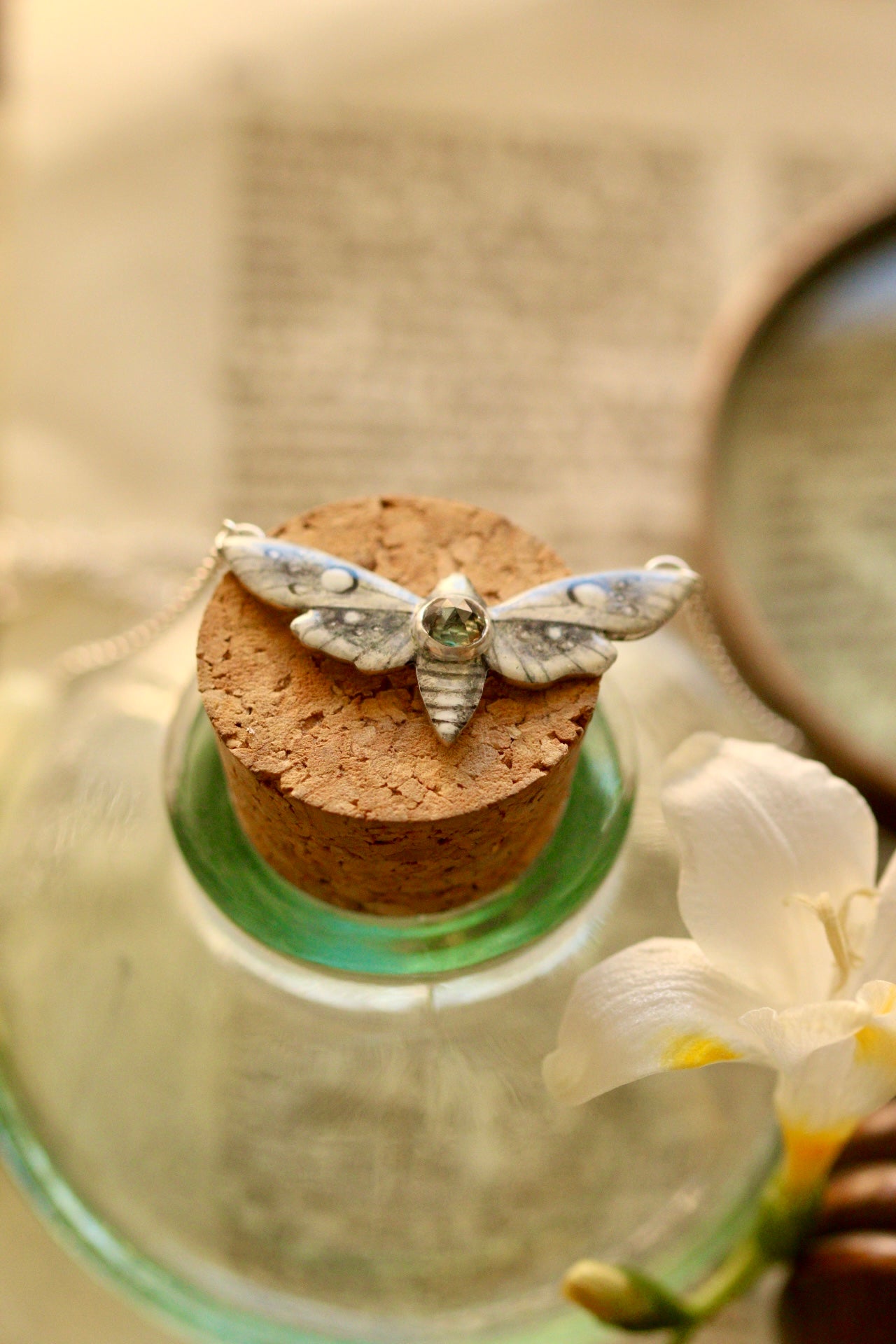 White moth pendant