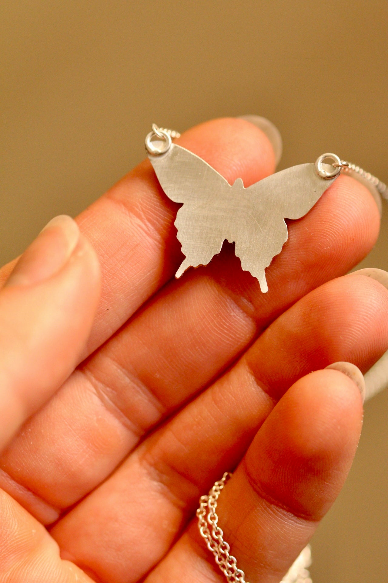 Black swallowtail pendant