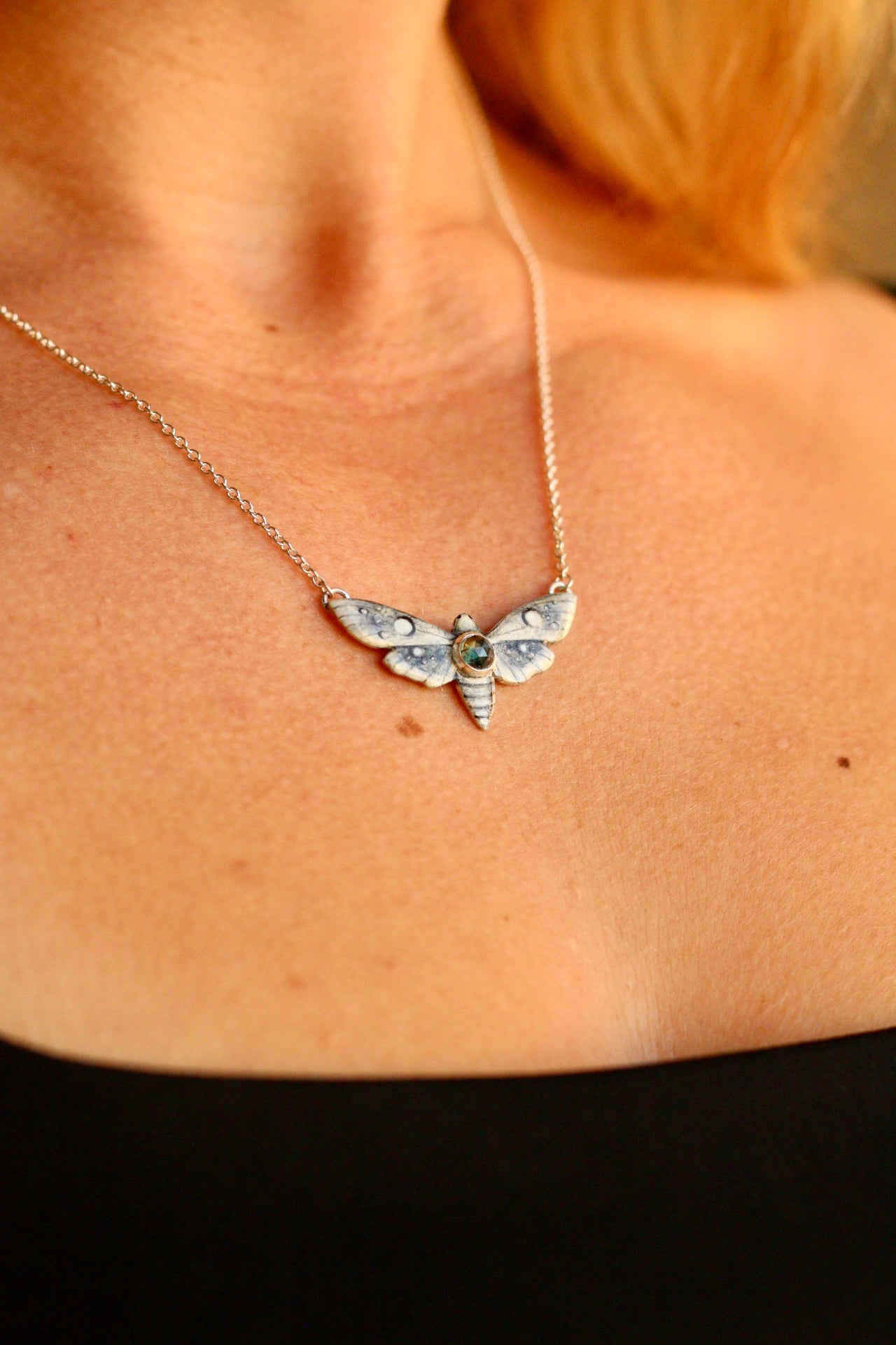 White moth pendant