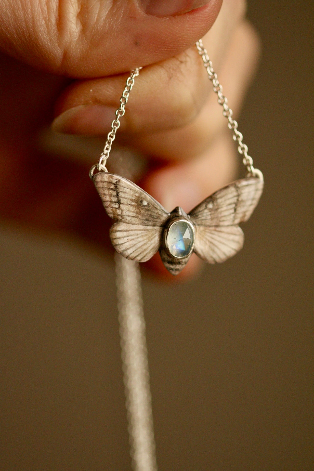 Pine-tree lappet moth pendant