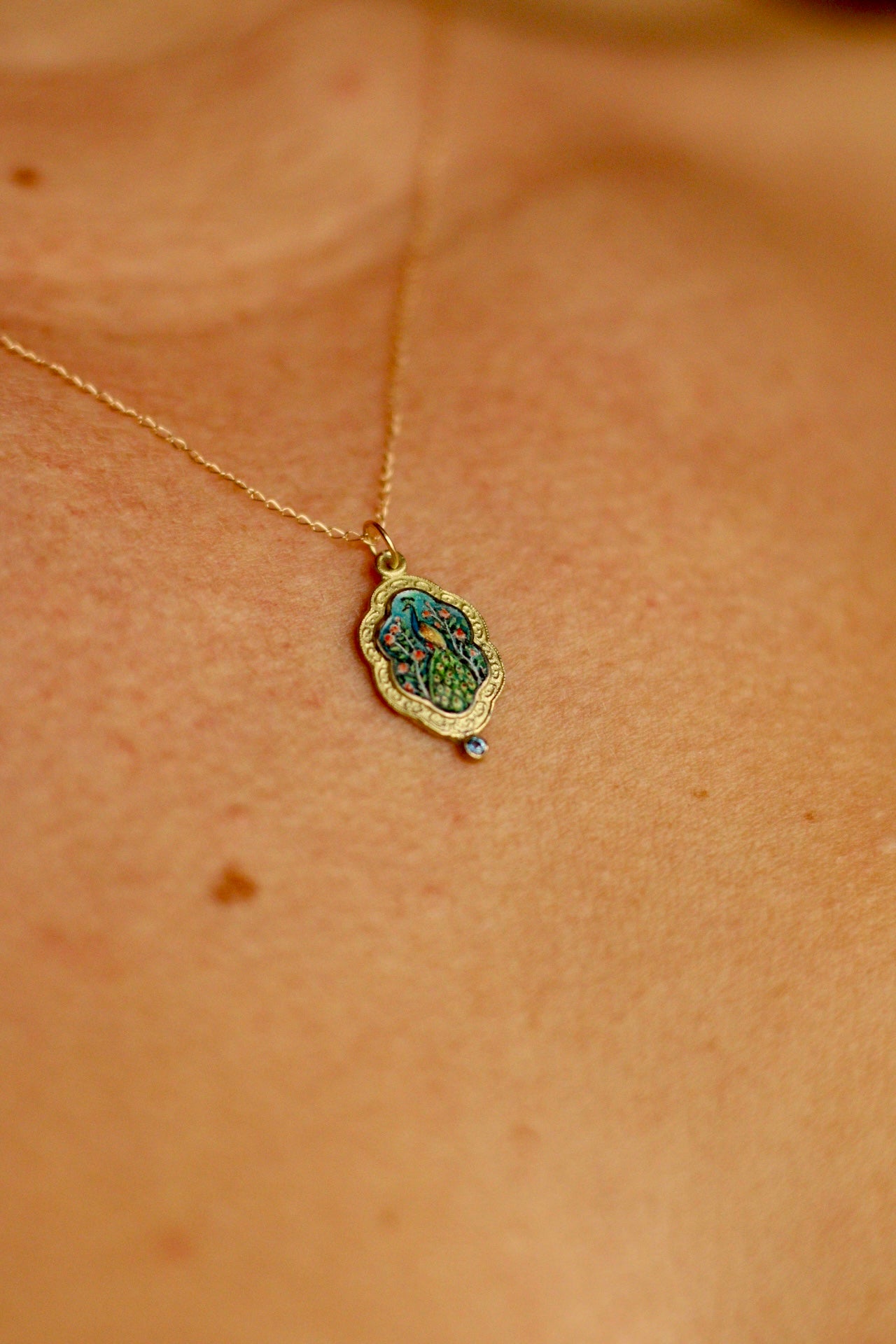 Solid 14k gold peacock pendant
