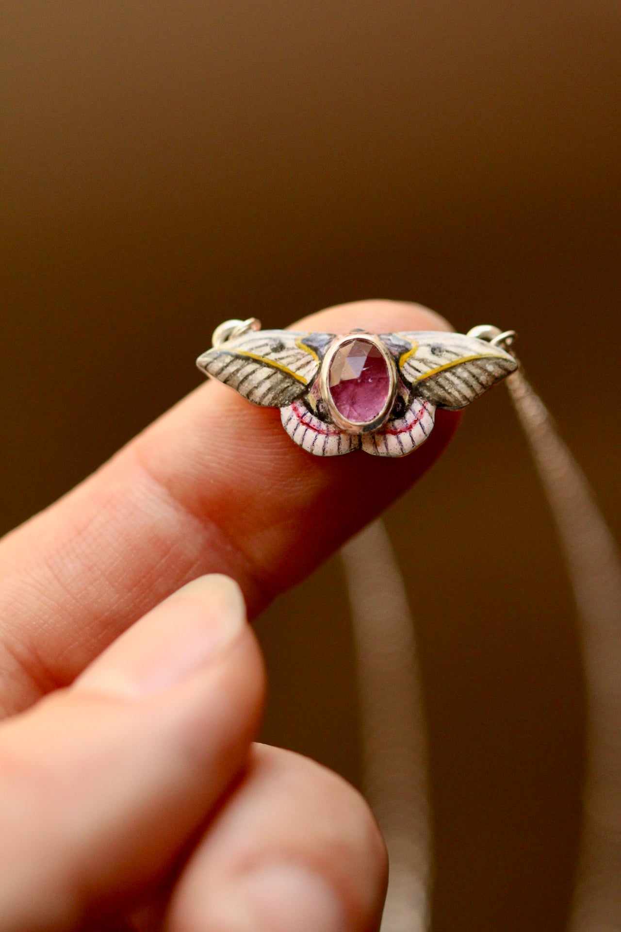Pink silk moth pendant