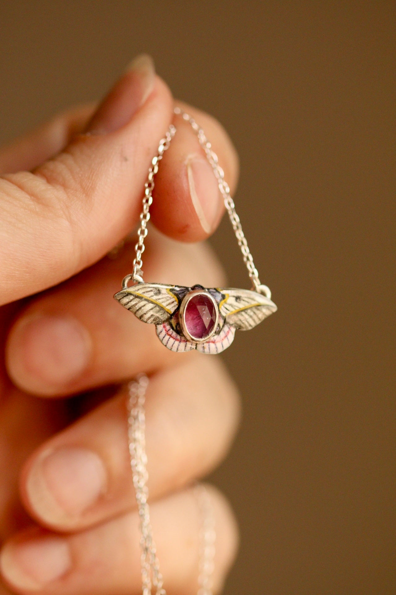 Pink silk moth pendant
